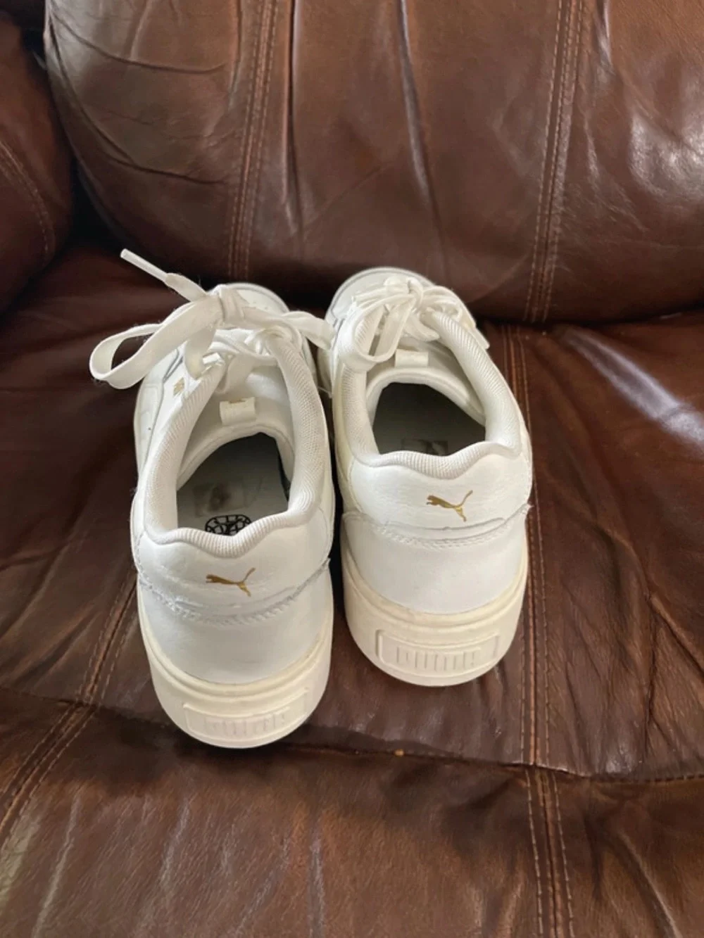 Women’s Puma white shoes